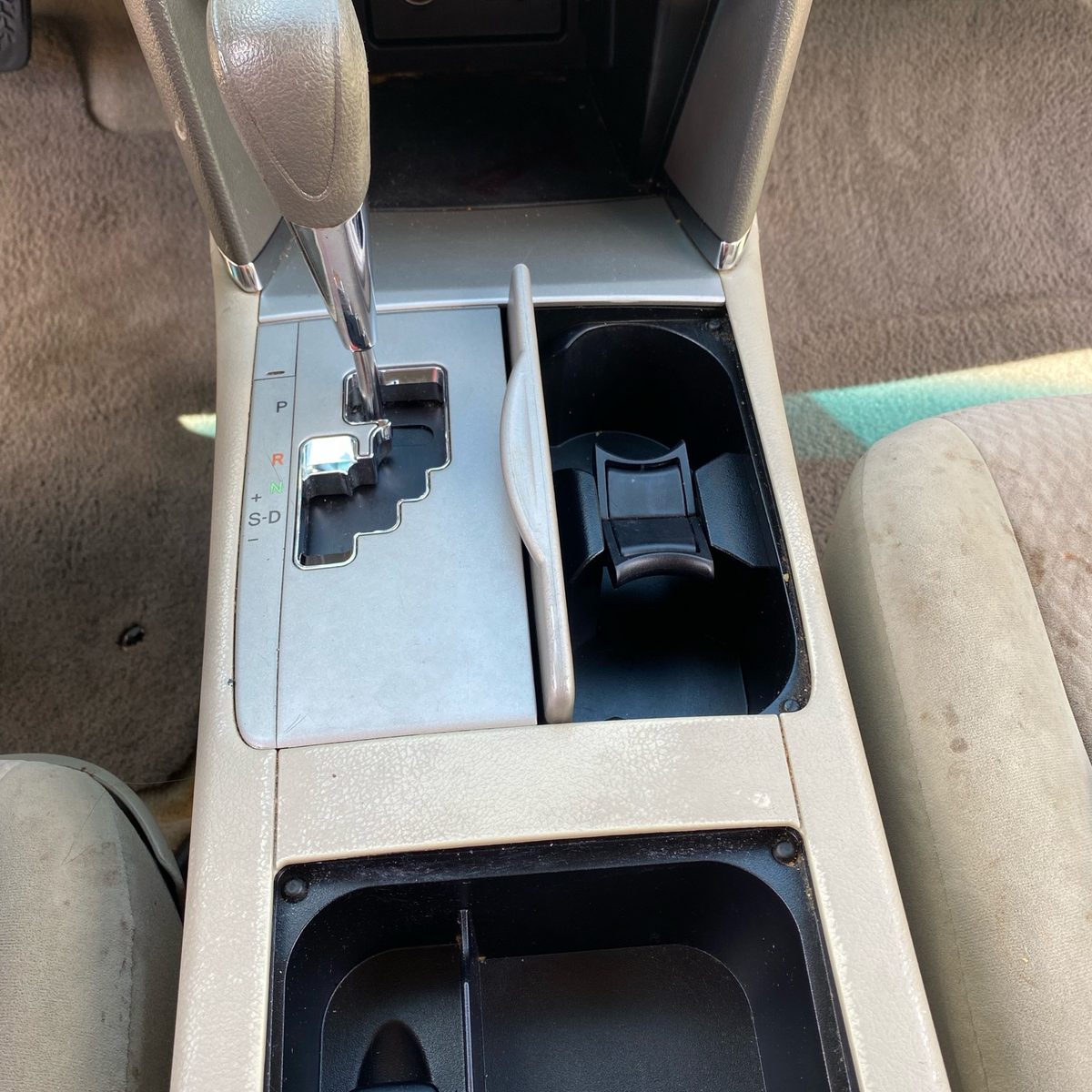 The same Toyota Camry centre console cleaned out and wiped down after a mobile interior detail