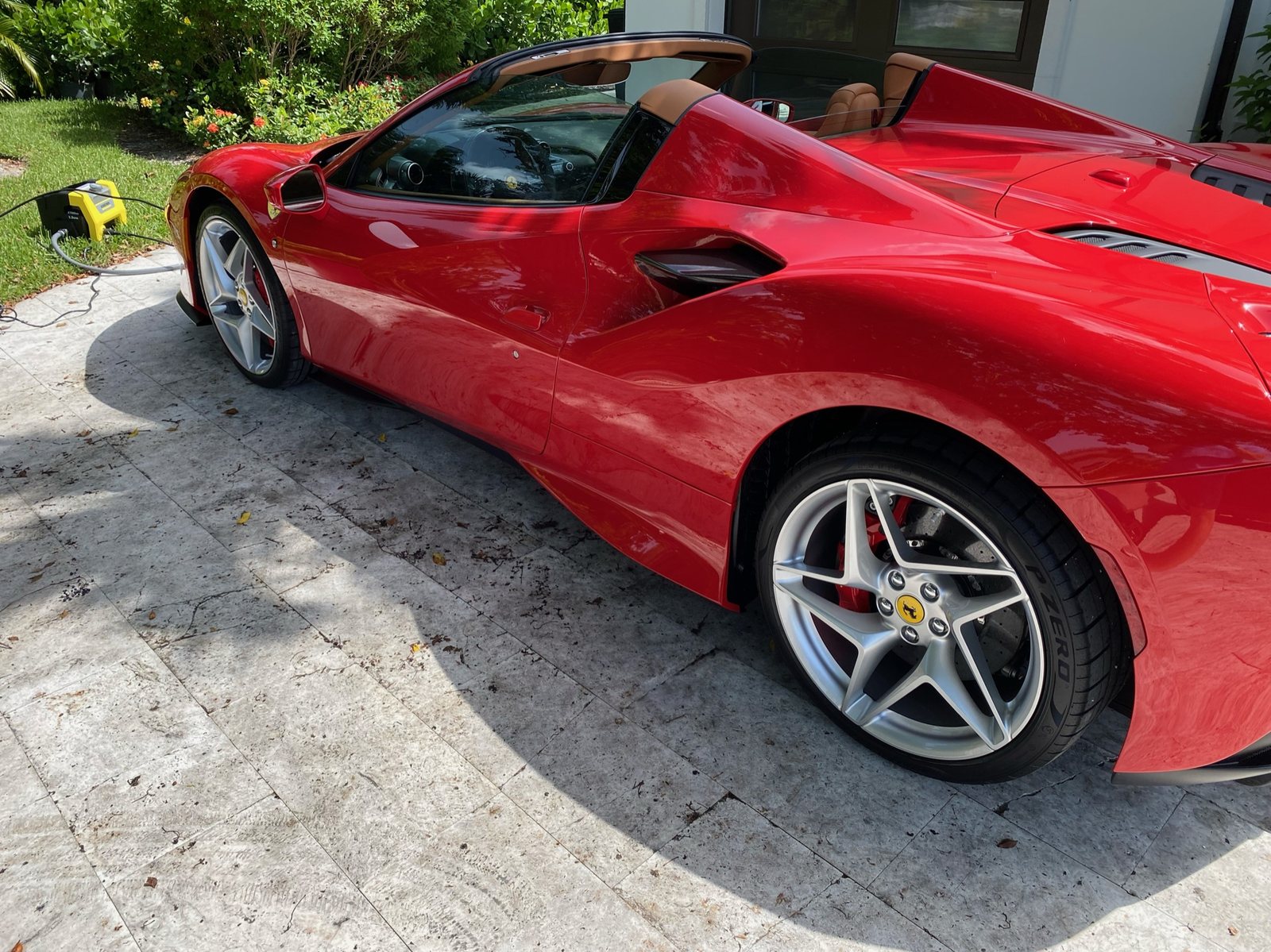 Ferrari F8 Spider side profile after a full detail in Naples, Florida