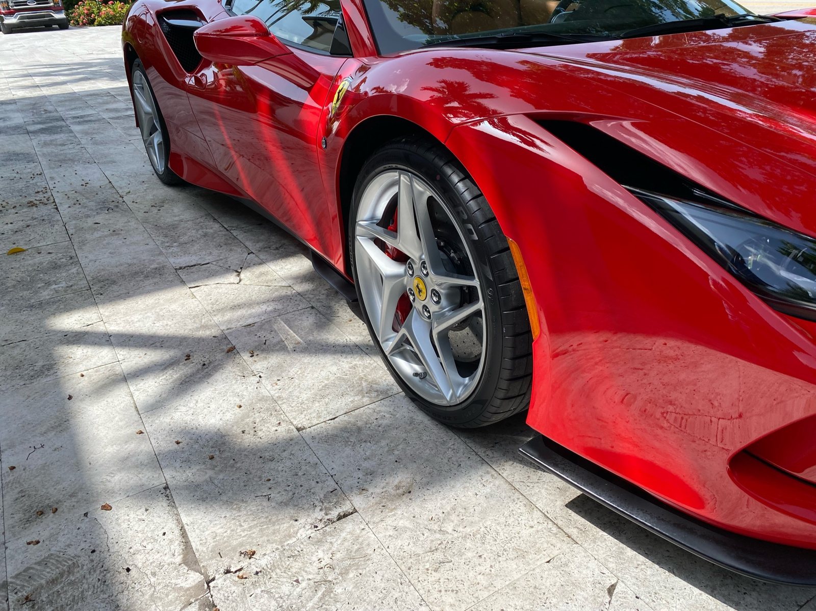 Deep gloss on Ferrari paintwork after a clay treatment and polish